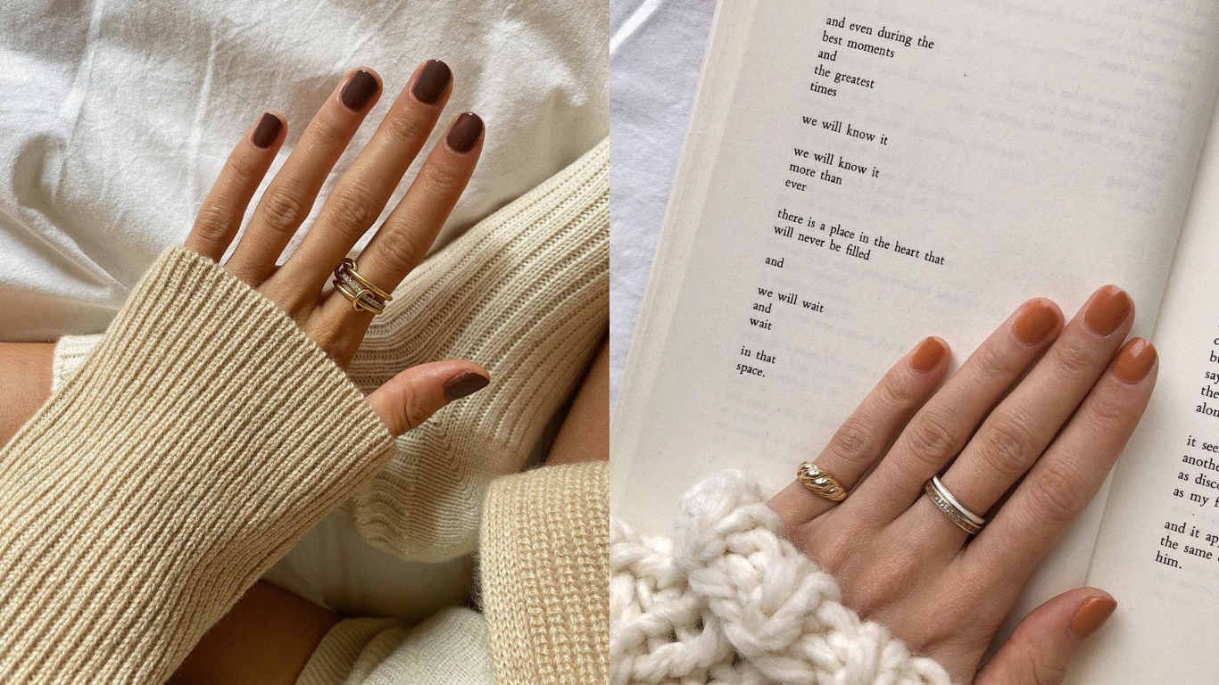paris - bàn tay xòe ra với kiểu nail màu nâu trầm